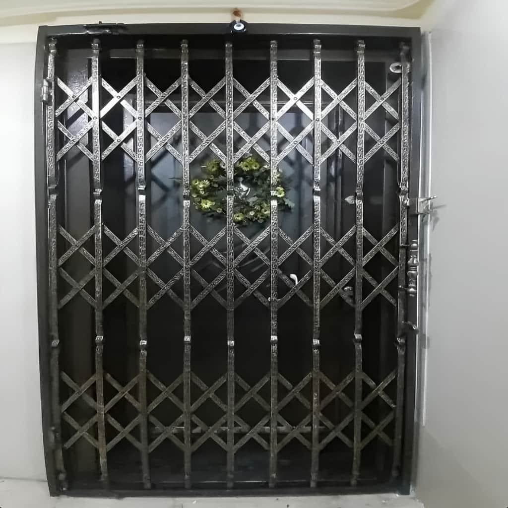 قیمت درب آکاردئونی حفاظ ساختمان سه گل در مریوان