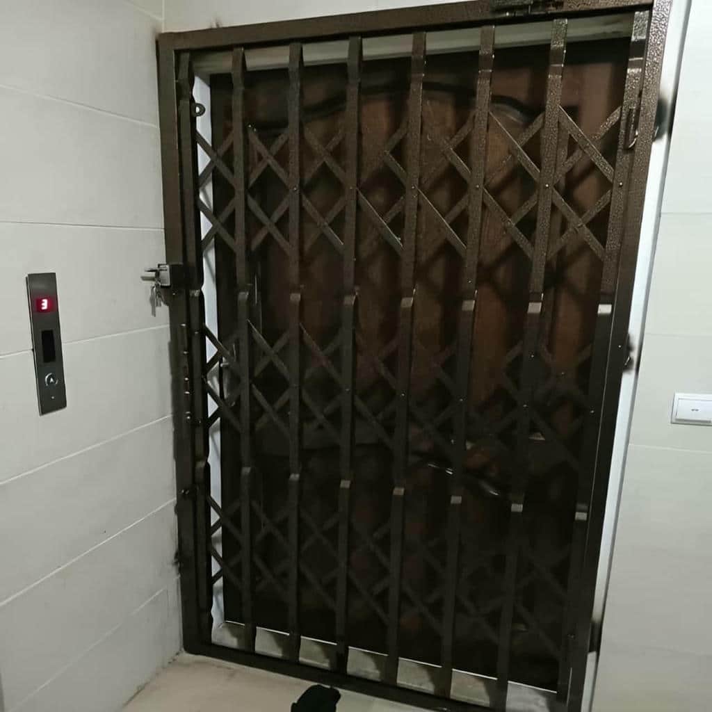 خرید درب آکاردئونی حفاظ ساختمان فلزی در شهرکرد