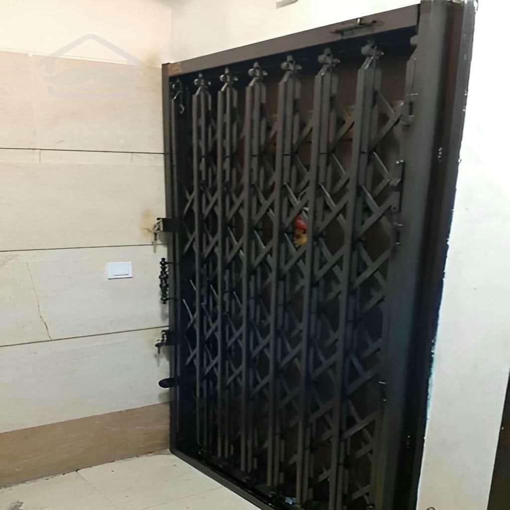 نصب درب آکاردئونی ساختمان چهارگل در ارومیه
