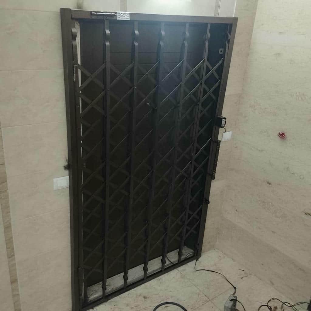 درب آکاردئونی حفاظ ساختمان در سقز