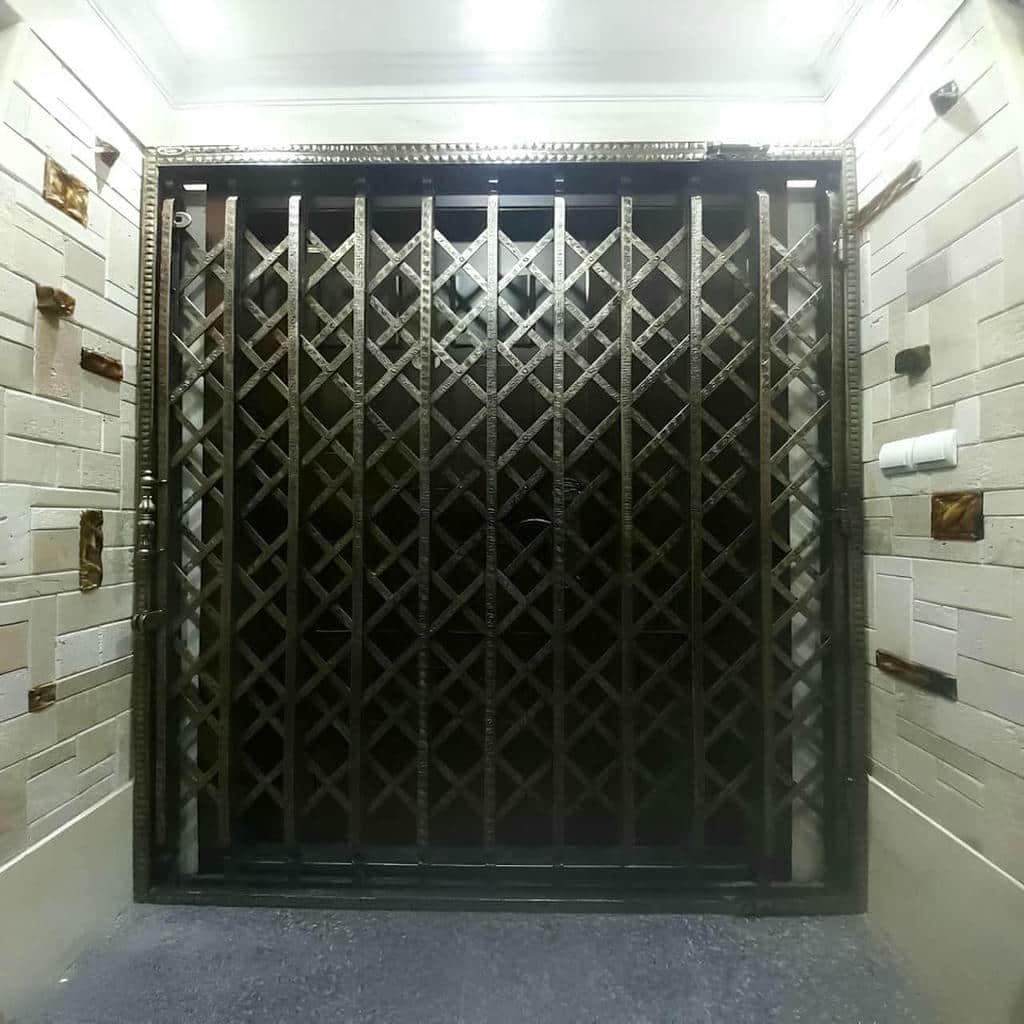 نصب درب آکاردئونی حفاظ ساختمان ضدزنگ در تهران