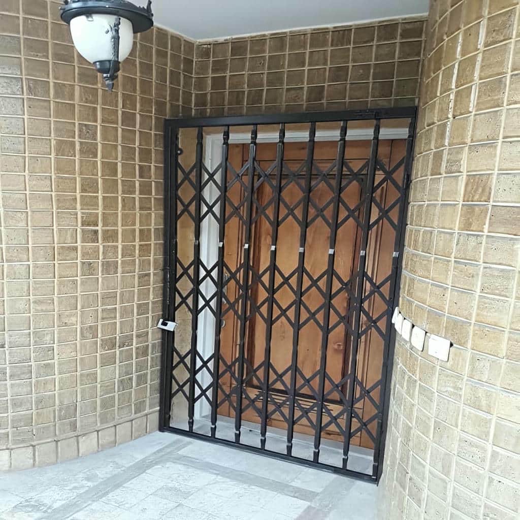 خرید درب آکاردئونی ساختمان دوگل در گنبدکاووس