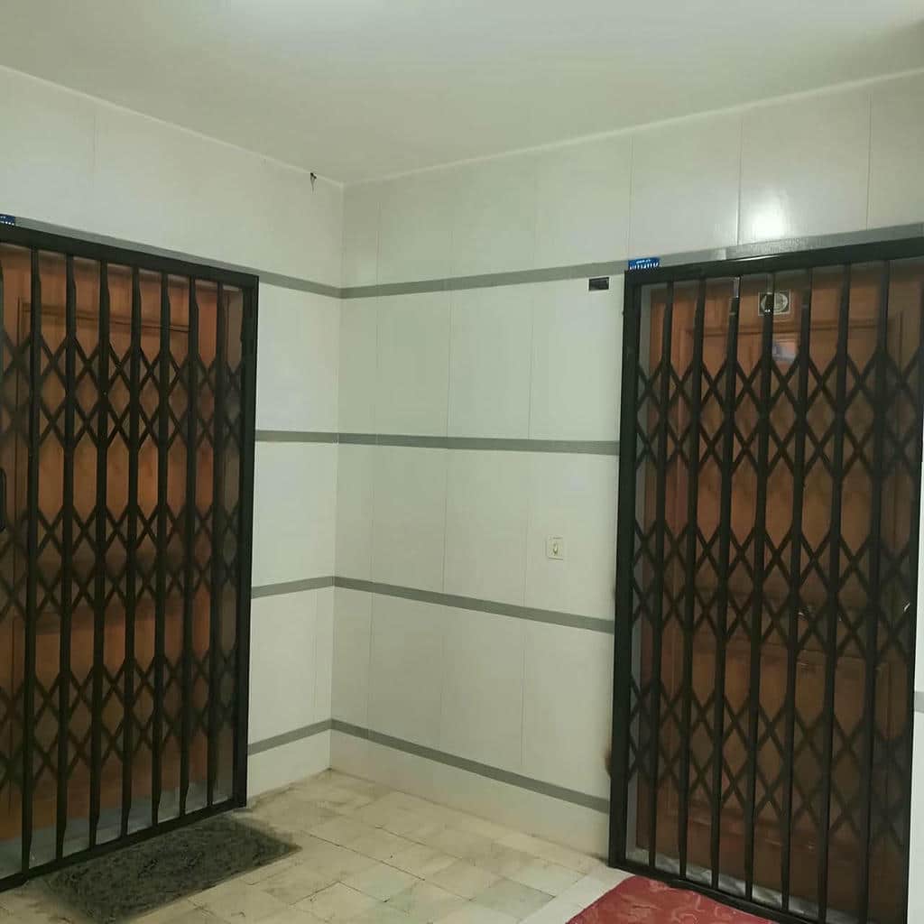 نصب درب آکاردئونی حفاظ ساختمان ریلی در آمل