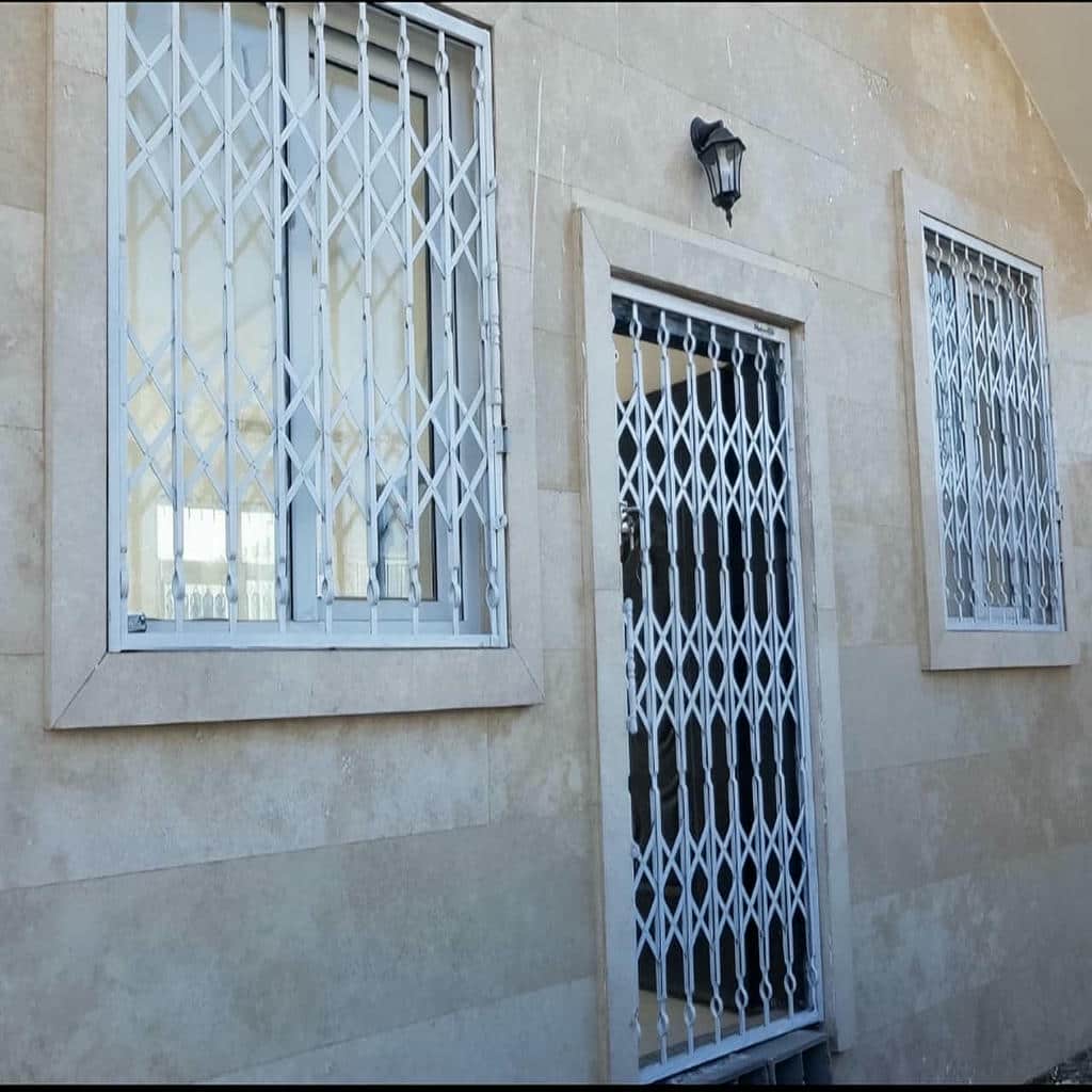 نصب درب آکاردئونی چهارگل در نظرآباد