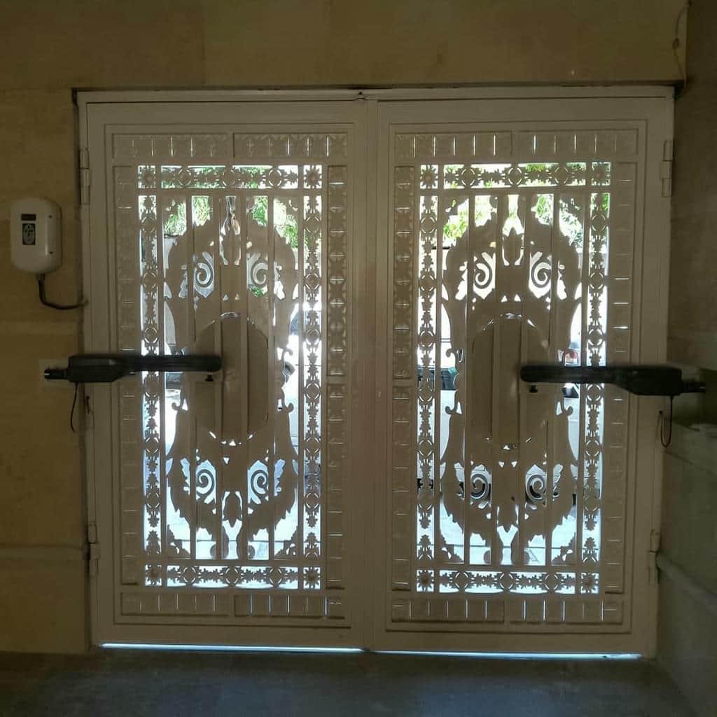 خرید جک درب پارکینگی بازویی در بومهن
