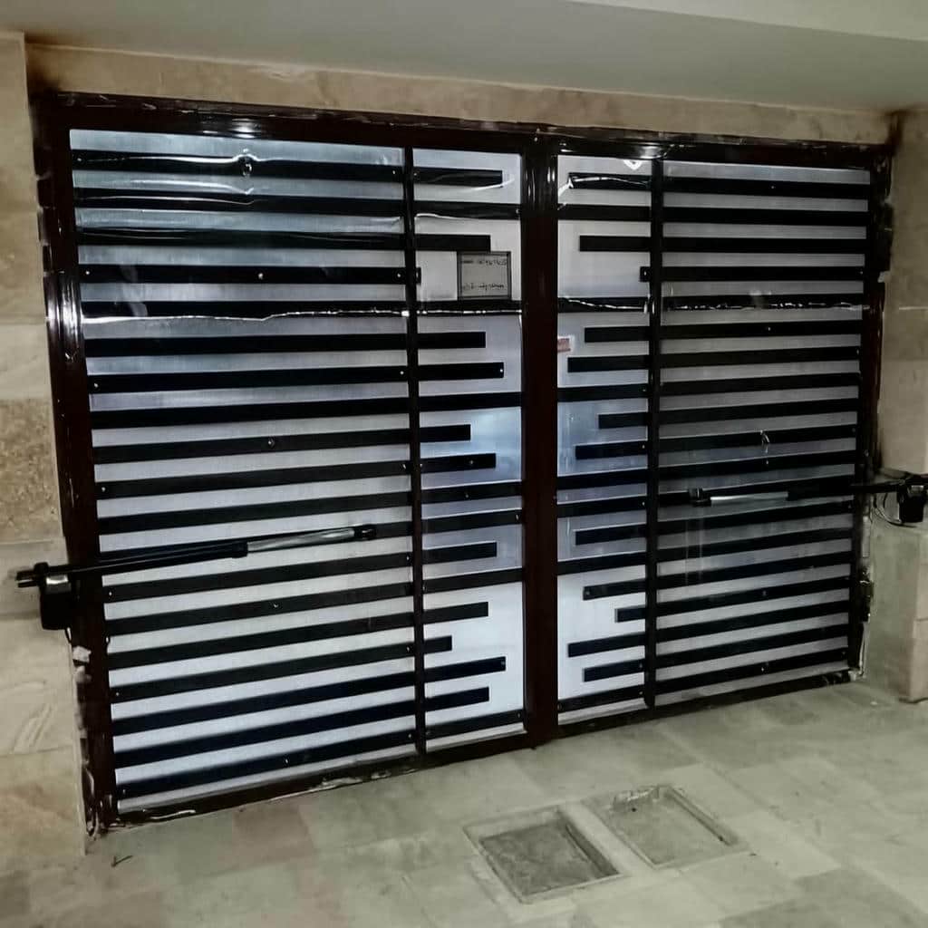 نصب جک درب پارکینگی اتوماتیک در آبادان