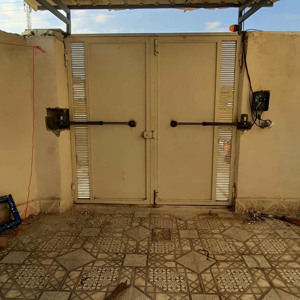 خرید جک درب پارکینگی بازویی در کمال شهر