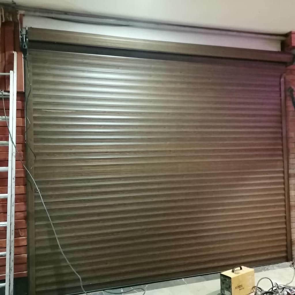 سفارش کرکره برقی ضد سرقت فروشگاهی رول گیتر