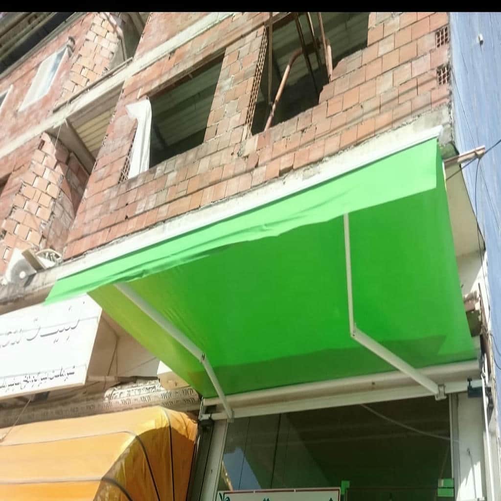 مدل بازویی سایبان برقی برای محوطه ویلا
